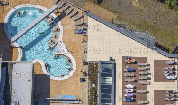 Aerial view, saltwater pool of the Olpe leisure pool, outdoor pool and indoor pool with sun loungers, Olpe town, Olpe, Sauerland, North Rhine-Westphalia, Germany