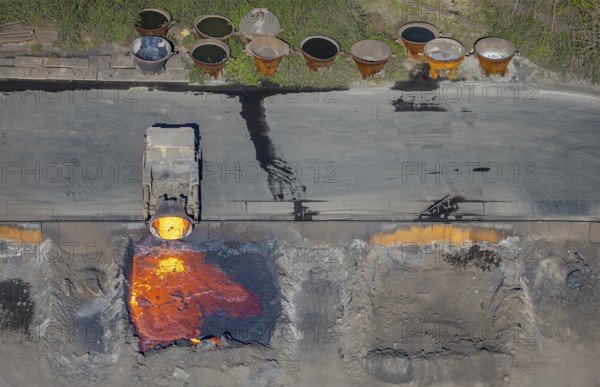 Aerial view, ArcelorMittal Hochfeld GmbH steel wire plant, dumping of red-hot material, Laar, Duisburg, Ruhr area, North Rhine-Westphalia, Germany