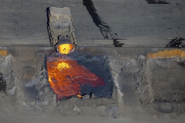 Aerial view, ArcelorMittal Hochfeld GmbH steel wire plant, dumping of red-hot material, Laar, Duisburg, Ruhr area, North Rhine-Westphalia, Germany