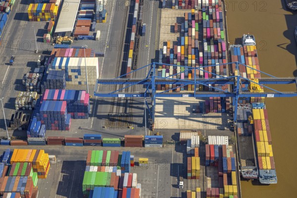 Aerial view, duisport port, logport I Rheinhausen, container port, Duisburg port D3T Duisburg Trimodal Terminal, container terminal and container ship, automobile logistics, Friemersheim, Duisburg, Ruhr area, North Rhine-Westphalia, Germany