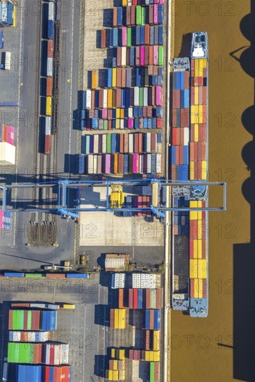 Aerial view, duisport port, logport I Rheinhausen, container port, Duisburg port D3T Duisburg Trimodal Terminal, container terminal and container ship, automobile logistics, Friemersheim, Duisburg, Ruhr area, North Rhine-Westphalia, Germany
