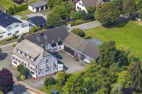 Aerial photo, Hubert Kenter Gasthof Zur Post, half-timbered house with colourful flower boxes, Reiste, Eslohe, Sauerland, North Rhine-Westphalia, Germany, café, DE, food and drink, Europe, inn, restaurant, gastronomy, aerial photography, aerial photography, aerial photography, Meschede, restaurant, Ruhr area, overview, accommodation, bird's-eye view, overview
