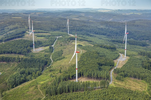 Aerial view, wind turbines in the forest area near Rümmecke, with forest damage, hilly landscape and distant view, Freienohl, Meschede, Sauerland, North Rhine-Westphalia, Germany, construction work, construction area, construction site, building site, construction project, construction site, DE, Europe, aerial view, aerial photography, aerial photography, aerial photography, Ruhr area, overview, bird's-eye view, bird's-eye view, overview