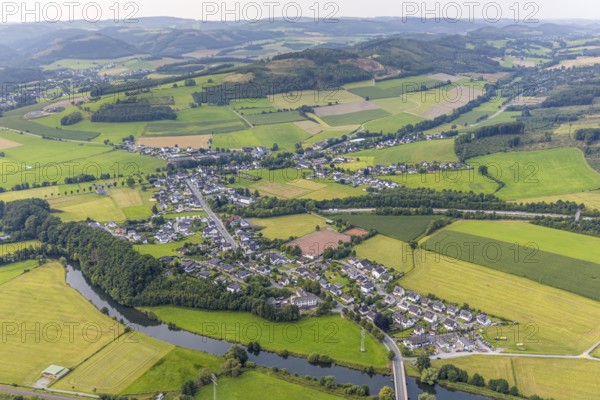 Aerial view, residential area local view district Olpe, sports field and tennis court Am Anger, Aschenplatz SC Olpe, Olpe, Meschede, Sauerland, North Rhine-Westphalia, Germany, DE, Europe, football, football field, football stadium, property tax, real estate, aerial view, aerial photography, aerial photography, Ruhr area, sports, sports facility, sports field, tennis, tennis facility, tennis court, tennis courts, tennis club, overview, bird's-eye view, housing estate, housing and living, residential area, residential quality, residential neighbourhood, housing estate, residential district, birds-eyes view, overview