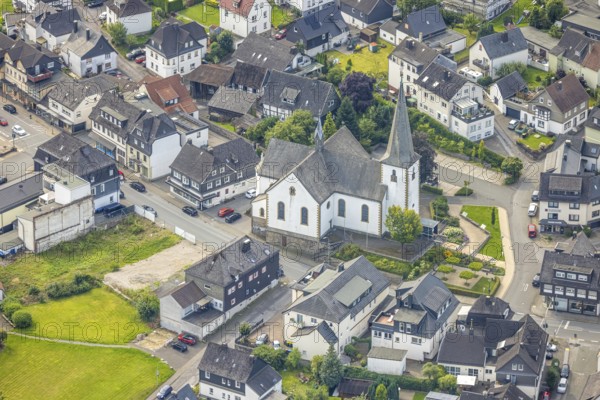 Aerial view, catholic St. Nikolaus parish church in the town centre, Freienohl, Meschede, Sauerland, North Rhine-Westphalia, Germany, place of worship, DE, Europe, religious community, place of worship, holy place, church, parish, denomination, aerial view, aerial photography, aerial photography, religion, religious site, Ruhr area, overview, bird's eye view, birds-eyes view, overview