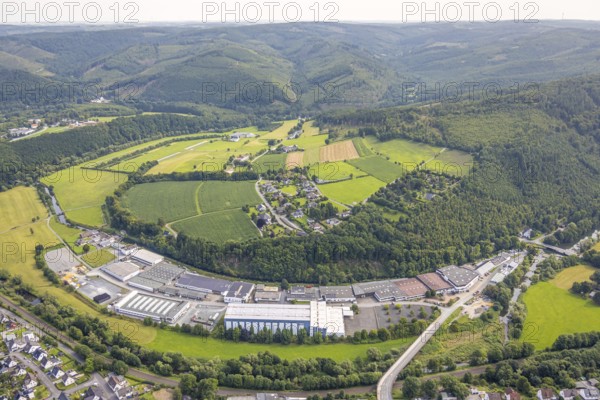 Aerial view, commercial area Im Langel at the edge of the forest, nature reserve Auf'm cock Giesmecketal and Arnsberger Wald, Freienohl, Meschede, Sauerland, North Rhine-Westphalia, Germany, DE, Europe, commercial enterprise, commercial area, commercial property, commercial site, commercial use, industrial area, industrial site, aerial photograph, aerial photography, aerial photography, Ruhr area, overview, bird's-eye view, birds-eyes view, overview