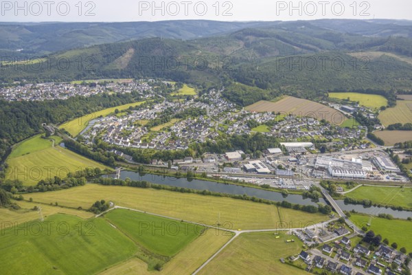 Aerial view, residential area local view district Freienohl, commercial area Bahnhofstraße, water extraction plant Freienohl, river Ruhr NSG and wooded hilly landscape, Freienohl, Meschede, Sauerland, North Rhine-Westphalia, Germany, DE, shopping, shopping centre, Europe, commercial enterprise, commercial space, commercial area, commercial property, commercial location, commercial use, property tax, real estate, aerial view, aerial photography, aerial photography, nature reserve, local supply centre, Ruhr area, shopping centre, supermarket, overview, bird's-eye view, residential complex, living and life, residential area, residential quality, residential quarter, housing estate, residential district, birds-eyes view, overview