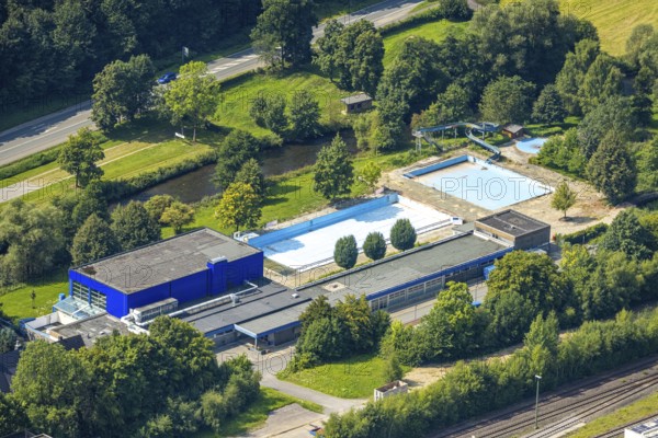 Aerial view, outdoor and indoor swimming pool Meschede without water, Meschede town, Meschede, Sauerland, North Rhine-Westphalia, Germany, bathing establishment, bathing resort, DE, Europe, outdoor swimming pool, leisure activities, indoor swimming pool, aerial view, aerial photography, aerial photography, cleaning, Ruhr area, swimming pool, swimming pool, swimming pool, overview, bird's-eye view, overview