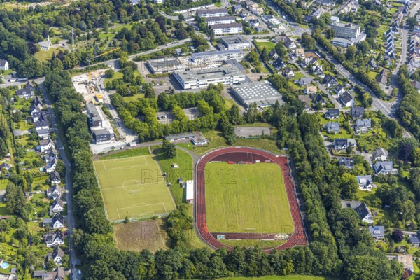 Aerial view, Dünnefeldstadion with side field, football stadium and athletics stadium, Berufskolleg Meschede des HSK Hochsauerlandkreis, Meschede-Stadt, Meschede, Sauerland, North Rhine-Westphalia, Germany, vocational school, education, educational institution, DE, Europe, football, football field, football stadium, educational institute, athletics stadium, aerial photograph, aerial photography, aerial photography, Ruhr area, school, sport, sports facility, sports field, overview, bird's-eye view, overview