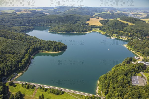 Aerial view, Hennesee with Hennesee dam, forest area, lonely sailing boat on the lake, Berghausen, Meschede, Sauerland, North Rhine-Westphalia, Germany, boat, DE, Europe, Hennetalsperre, aerial view, aerial photography, aerial photography, Ruhr area, reservoir, overview, bird's-eye view, overview