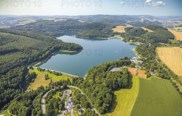Aerial view, Welcome Hotel Meschede/Hennesee am Hennesee with Hennesee dam, forest area, lonely sailing boat on the lake, Berghausen, Meschede, Sauerland, North Rhine-Westphalia, Germany, boat, DE, Europe, gastronomy, Hennetalsperre, hotel, hotel complex, hotel business, aerial view, aerial photography, aerial photography, Ruhr area, reservoir, overview, bird's-eye view, overview