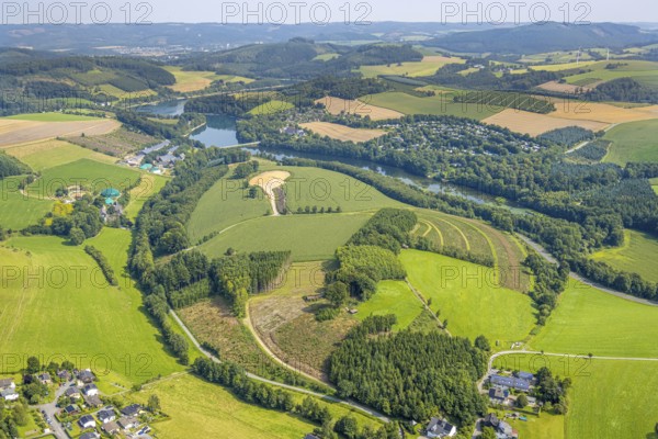 Aerial view, construction site near Obermielinghausen, Mielinghausen Henne forebay with Knaus Campingpark Hennesee and Hennesee holiday village on the left, Enkhausen, Meschede, Sauerland, North Rhine-Westphalia, Germany, construction area, building site, building plots, construction measure, construction project, construction site, camping, camping site, camping houses, camping mobile, camping site, DE, Europe, holiday resort, leisure, hobby, aerial view, aerial photography, aerial photography, Ruhr area, overview, bird's eye view, motorhome, caravan, birds-eyes view, overview
