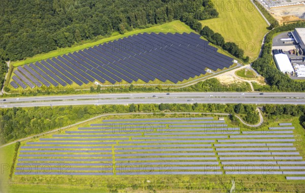 Aerial view, Enste-Süd industrial estate with Enste solar park on the A46 motorway, Enste, Meschede, Sauerland, North Rhine-Westphalia, Germany, A46 motorway, construction work, construction area, construction site, building plots, construction project, construction site, DE, Europe, commercial enterprises, commercial area, industrial estate, industrial park, commercial site, commercial use, large construction site, industrial area, industrial building, industrial site, aerial view, aerial photography, aerial photography, new construction, photovoltaic, photovoltaic plant, Ruhr area, solar, solar plant, solar energy, solar park, overview, bird's-eye view, birds-eyes view, overview