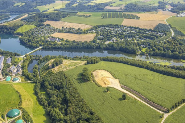 Aerial view, construction site near Obermielinghausen, Mielinghausen Henne forebay with Knaus Campingpark Hennesee and Hennesee holiday village on the left, Enkhausen, Meschede, Sauerland, North Rhine-Westphalia, Germany, construction area, building site, building plots, construction measure, construction project, construction site, camping, camping site, camping houses, camping mobile, camping site, DE, Europe, holiday resort, leisure, hobby, aerial view, aerial photography, aerial photography, Ruhr area, overview, bird's eye view, motorhome, caravan, birds-eyes view, overview