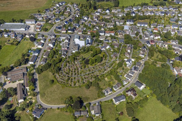 Aerial view, Evangelical church Oberbrügge and evang. Cemetery, residential area on Heerstraße, Oberbrügge, Halver, Sauerland, North Rhine-Westphalia, Germany, place of worship, burial place, DE, Europe, cemetery, memorial, religious community, place of worship, house of God, property tax, graves, burial ground, sacred site, real estate, Kierspe, church, parish, denomination, aerial view, aerial photography, aerial photography, religion, religious site, resting place, Ruhr area, overview, bird's-eye view, residential area, housing and living, residential area, quality of living, residential neighbourhood, housing estate, residential district, birds-eyes view, overview
