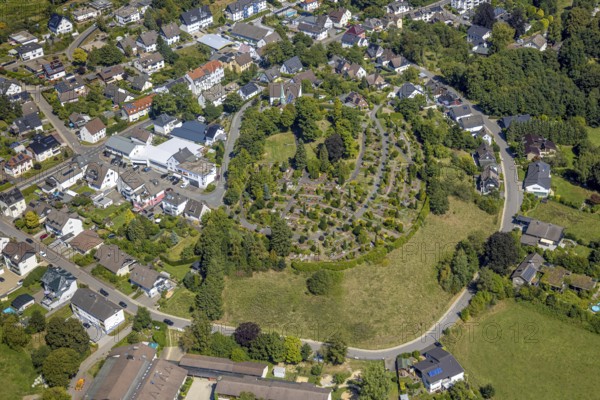 Aerial view, Evangelical church Oberbrügge and evang. Cemetery, residential area on Heerstraße, Oberbrügge, Halver, Sauerland, North Rhine-Westphalia, Germany, place of worship, burial place, DE, Europe, cemetery, memorial, religious community, place of worship, house of God, property tax, graves, burial ground, sacred site, real estate, Kierspe, church, parish, denomination, aerial view, aerial photography, aerial photography, religion, religious site, resting place, Ruhr area, overview, bird's-eye view, residential area, housing and living, residential area, quality of living, residential neighbourhood, housing estate, residential district, birds-eyes view, overview