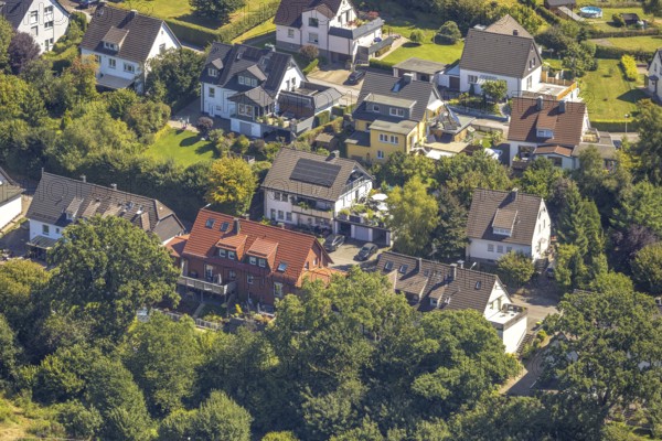 Aerial view, residential building with solar roof on Wiesenstraße, Höferhof, Kierspe, Sauerland, North Rhine-Westphalia, Germany, DE, roof with solar panels, Europe, property tax, real estate, aerial view, aerial photography, aerial photography, photovoltaic system, Ruhr area, solar, solar system, solar roof, solar energy, solar panels, solar power system, overview, bird's eye view, residential complex, living and life, residential area, residential quality, residential neighbourhood, housing estate, residential area, birds-eyes view, overview