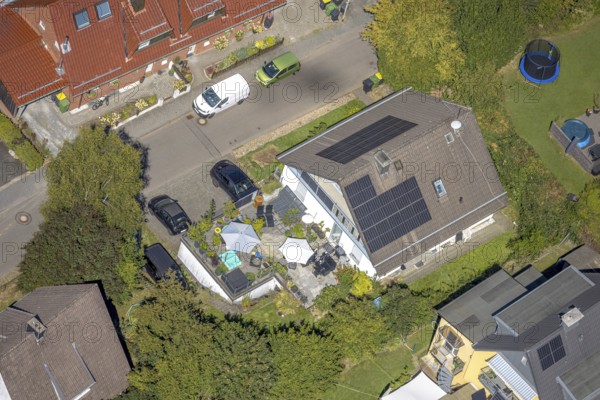 Aerial view, residential building with solar roof on Wiesenstraße, Höferhof, Kierspe, Sauerland, North Rhine-Westphalia, Germany, DE, roof with solar panels, Europe, property tax, real estate, aerial view, aerial photography, aerial photography, photovoltaic system, Ruhr area, solar, solar system, solar roof, solar energy, solar panels, solar power system, overview, bird's eye view, residential complex, living and life, residential area, residential quality, residential neighbourhood, housing estate, residential area, birds-eyes view, overview