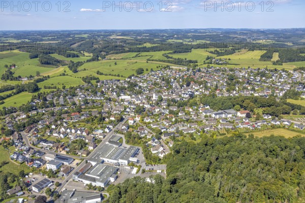 Aerial view, residential area, local view Kierspe-Dorf, hilly landscape with distant view, below Walter Potthoff GmbH - Member of Plastiflex Group, Kierspe, Sauerland, North Rhine-Westphalia, Germany, DE, Europe, property tax, real estate, aerial view, aerial photography, aerial photography, Ruhr area, overview, bird's-eye view, residential complex, living and living, residential area, quality of life, residential neighbourhood, housing estate, residential area, birds-eyes view, overview