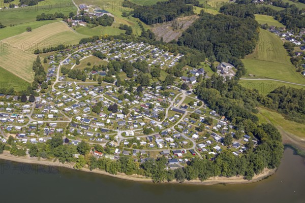Aerial view, Lambacher Höhe campsite and mobile home site at the Lingesetalsperre, Linge, Marienheide, Sauerland, North Rhine-Westphalia, Germany, camping, camping site, camping homes, campsite, DE, Europe, leisure, hobby, Kierspe, aerial view, aerial photography, aerial photography, Ruhr area, reservoir, overview, bird's eye view, forest area, birds-eyes view, overview