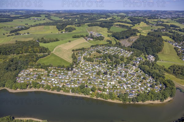 Aerial view, Lambacher Höhe campsite and mobile home site at the Lingesetalsperre, Linge, Marienheide, Sauerland, North Rhine-Westphalia, Germany, camping, camping site, campsite, DE, Europe, leisure, hobby, Kierspe, aerial view, aerial photography, aerial photography, Ruhr area, reservoir, overview, bird's eye view, forest area, birds-eyes view, overview