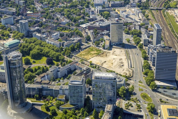 Aerial view, Campus Essen. Construction site, Kölbl Kruse construction site near Freiheit, left Westenergie tower, Innogy high-rise, right Fakt Tower thyssenkrupp, DB Schenker, Postbank high-rise, Südviertel, Essen, Ruhr area, North Rhine-Westphalia, Germany