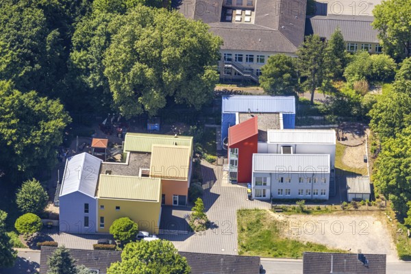Aerial view, Protestant day care centre Kita Samoastraße, Stepke family centre with brightly coloured houses next to Borbeck comprehensive school, Gerschede, Essen, Ruhr area, North Rhine-Westphalia, Germany