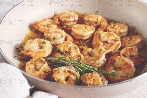 Shrimp dish cooked, in savory sauce. with fragrant herbs, and spices