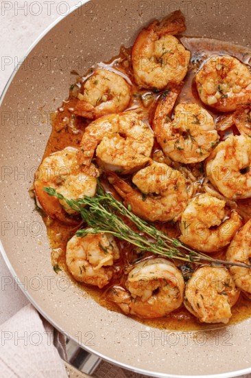 Shrimp dish cooked, in savory sauce. with fragrant herbs, and spices