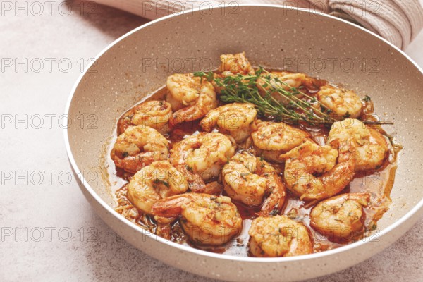 Shrimp dish cooked, in savory sauce. with fragrant herbs, and spices