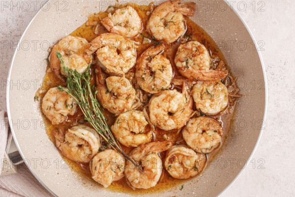 Shrimp dish cooked, in savory sauce. with fragrant herbs, and spices