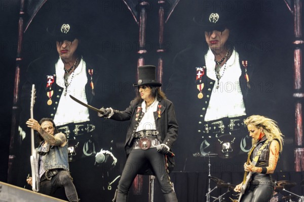 Chuck Garric (bassist), Alice Cooper (singer) and Nita Strauß (guitarist) live at the Scorpions 60 Years Anniversary Concert in the Heinz-von-Heiden-Arena in Hanover on 05.07.2025