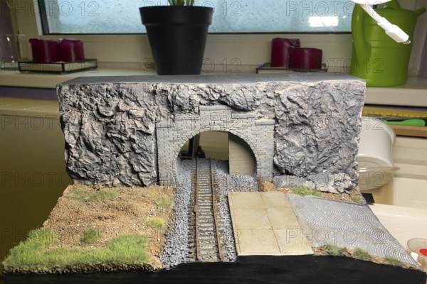 Model making diorama: railway tunnel with tracks and rocky landscape, Haan, North Rhine-Westphalia, Germany