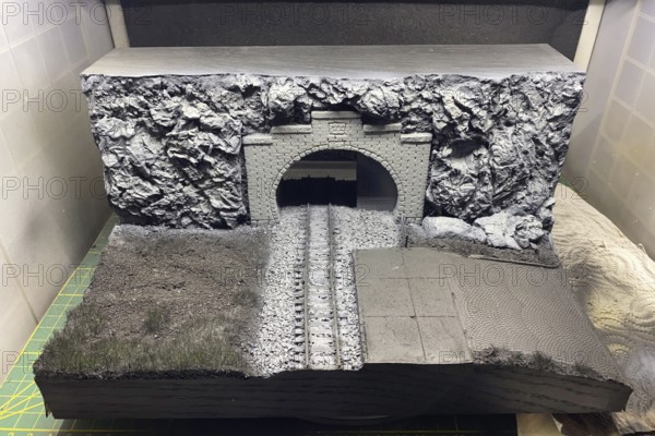 Model making diorama: railway tunnel, tracks and rocky landscape, Haan, North Rhine-Westphalia, Germany