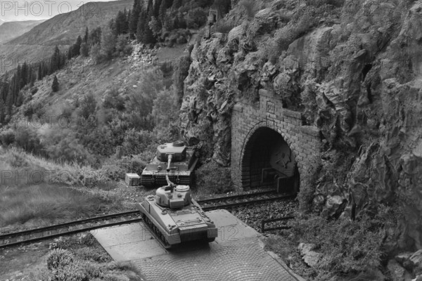 Model diorama: Sherman and Tiger tanks at the mountain tunnel