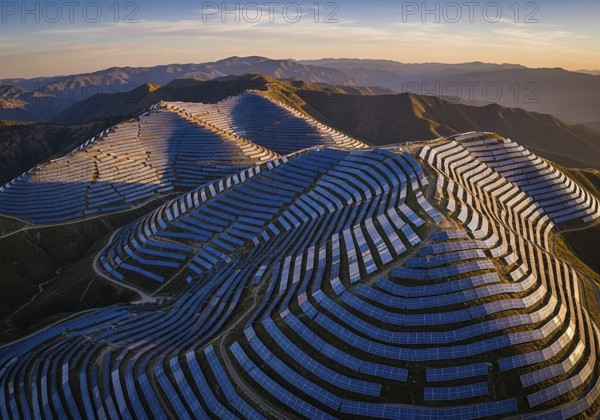 Winding rows of solar panels seamlessly integrated into a mountainous landscape under a dynamic sky, symbolizing renewable energy and a sustainable future.AI Generated
