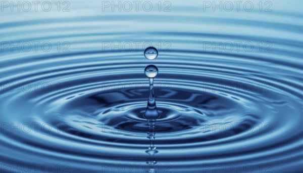 A close-up shot captures the graceful descent of water drops, creating ripples and a mesmerizing display of liquid dynamics, AI generated