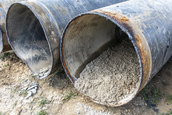 Cut open pipes with concrete residue, Manheim, North Rhine-Westphalia, Germany