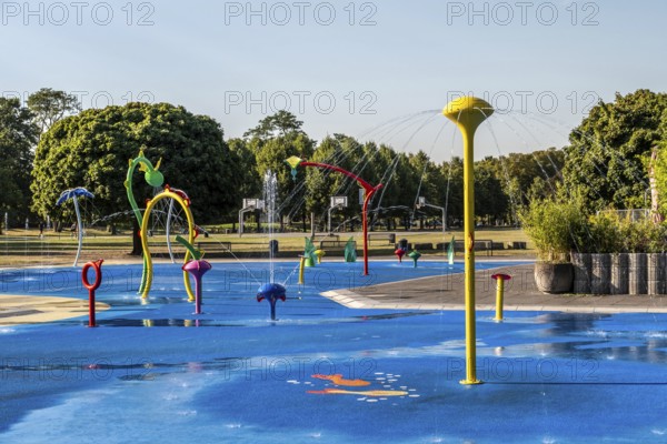 Water playground with colourful fountains, green belt, Cologne, North Rhine-Westphalia, Germany