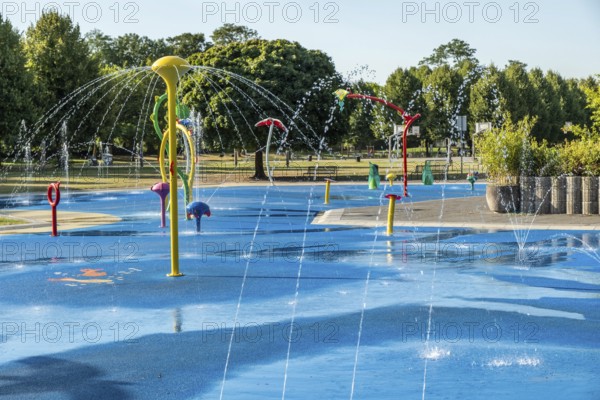 Water playground with colourful fountains at a glance, green belt, Cologne, North Rhine-Westphalia