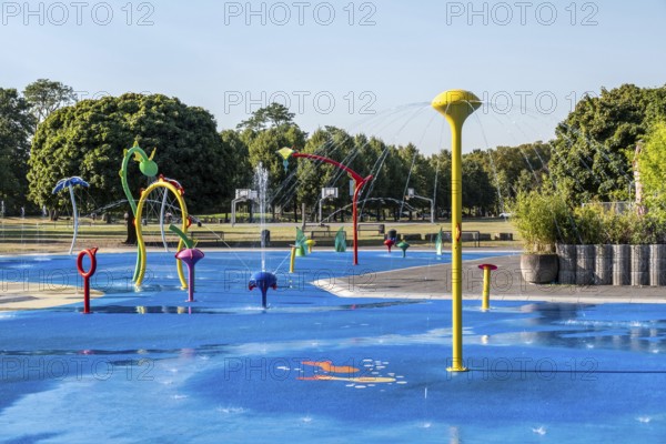 Water playground with colourful fountains, green belt, Cologne, North Rhine-Westphalia, Germany