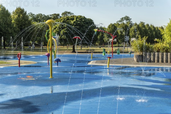 Water playground with colourful fountains, green belt, Cologne, North Rhine-Westphalia, Germany