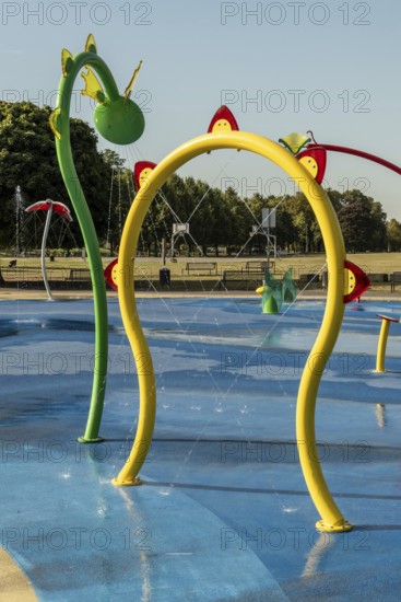 Water playground with large yellow arch, green belt, Cologne, North Rhine-Westphalia