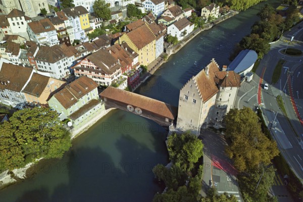 View of the old town with the river Limmat and the covered wooden bridge with the Landvogteischloss, Baden, Canton, Aargau, Switzerland