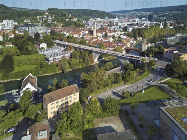 View of the town with the high bridge in front, the old town and the covered wooden bridge with the Landvogteischloss on the river Limmat behind, Baden, Canton, Aargau, Switzerland
