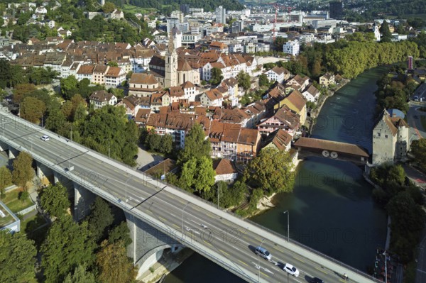 View of the old town with the high bridge in front, the old town and the covered wooden bridge with the Landvogteischloss on the river Limmat behind, Baden, Canton, Aargau, Switzerland
