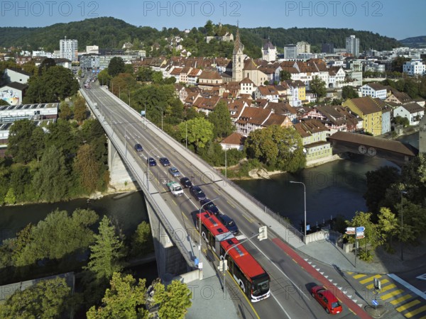 View of the old town with the parish church of Maria Himmelfahrt, in the foreground the high bridge, in the background the ruins of Stein Castle formerly an administrative centre of the Habsburgs, on the right the river Limmat and the covered wooden bridge, Baden, Canton, Aargau, Switzerland