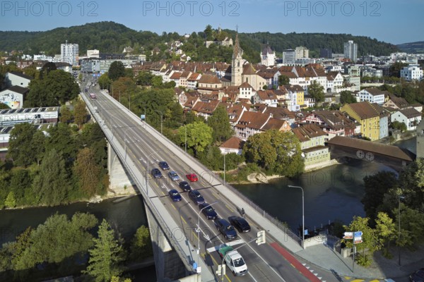 View of the old town with the parish church of Maria Himmelfahrt, in the foreground the high bridge, in the background the ruins of Stein Castle, formerly an administrative centre of the Habsburgs, on the right the river Limmat and the covered wooden bridge, Baden, Canton Aargau, Switzerland