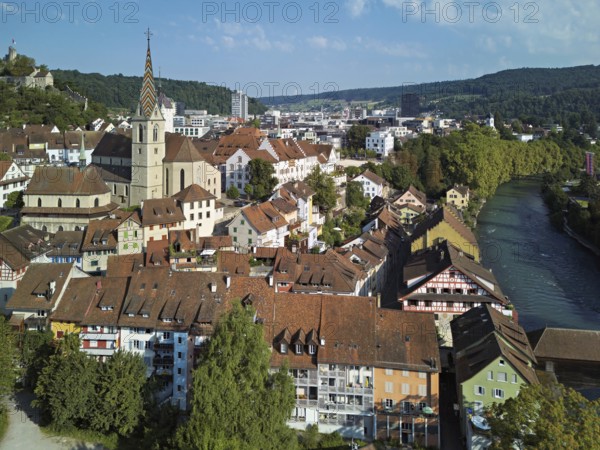View of the old town with the parish church Maria Himmelfahrt, in the background the ruins of Stein Castle, formerly an administrative centre of the Habsburgs, on the right the river Limmat, Baden, Canton, Aargau, Switzerland