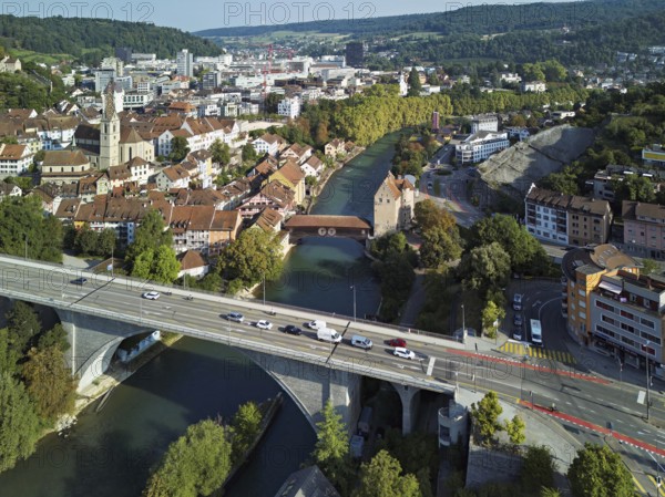 View of the town with the high bridge in front, the old town and the covered wooden bridge with the Landvogteischloss on the river Limmat behind, Baden, Canton, Aargau, Switzerland